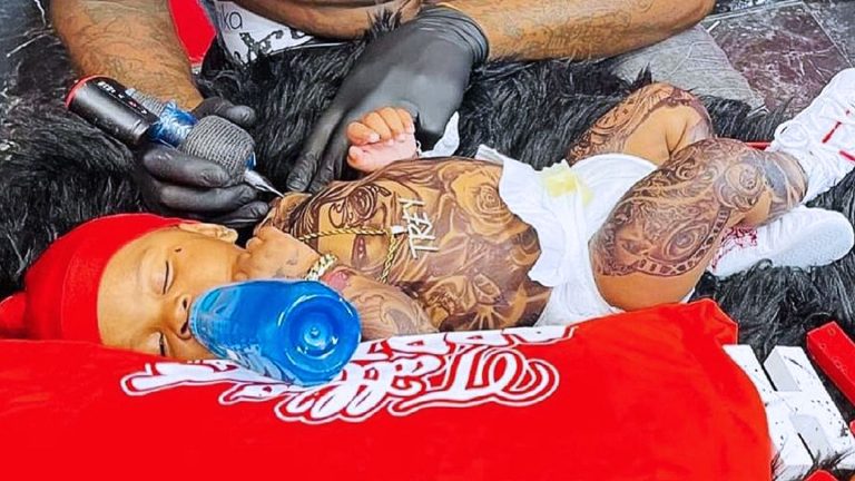 Tattoo: Fully tattooed infant-what the video is all about